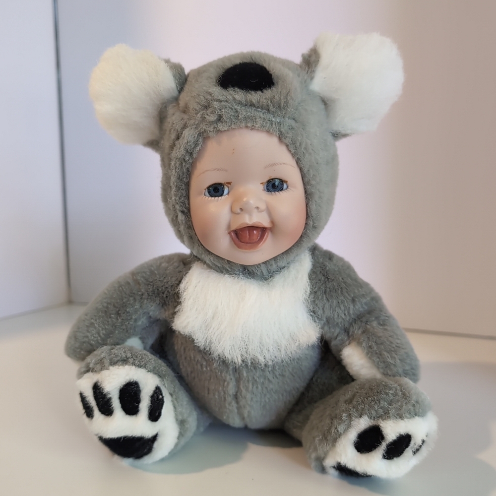 Vintage Show Stoppers Porcelain Faced Baby in Koala Plush